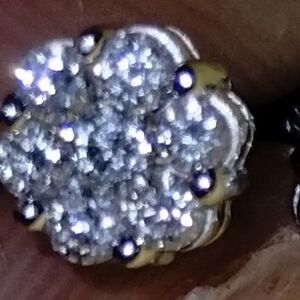 Diamond Earrings , half carat screw in back one back is missing